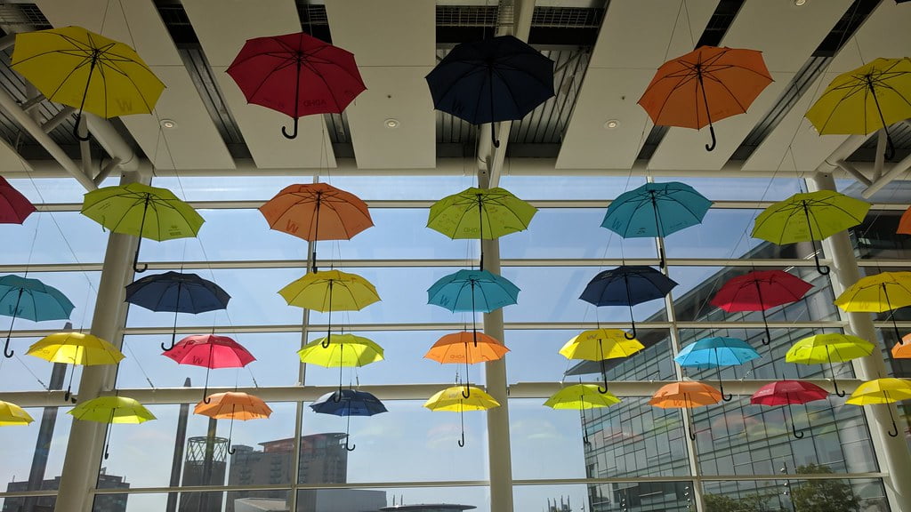 neurodiversity different bright colored umbrellas

