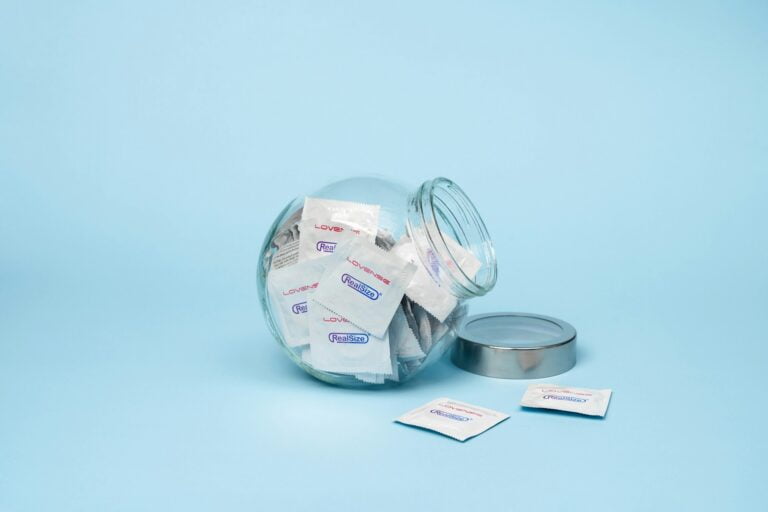 a glass jar filled with lots of tissues