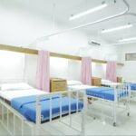 empty hospital bed inside room